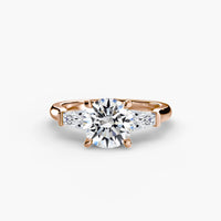 Round Three Stone Tapered Baguette Ring