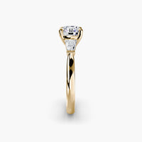 Round Three Stone Tapered Baguette Ring