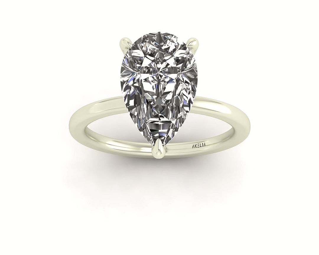 Pear Diamond Set Prongs Solitaire Engagement Ring