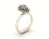 Clasped Pear Halo Pavé Engagement Ring