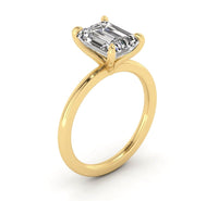 Classic Emerald Solitaire Engagement Ring