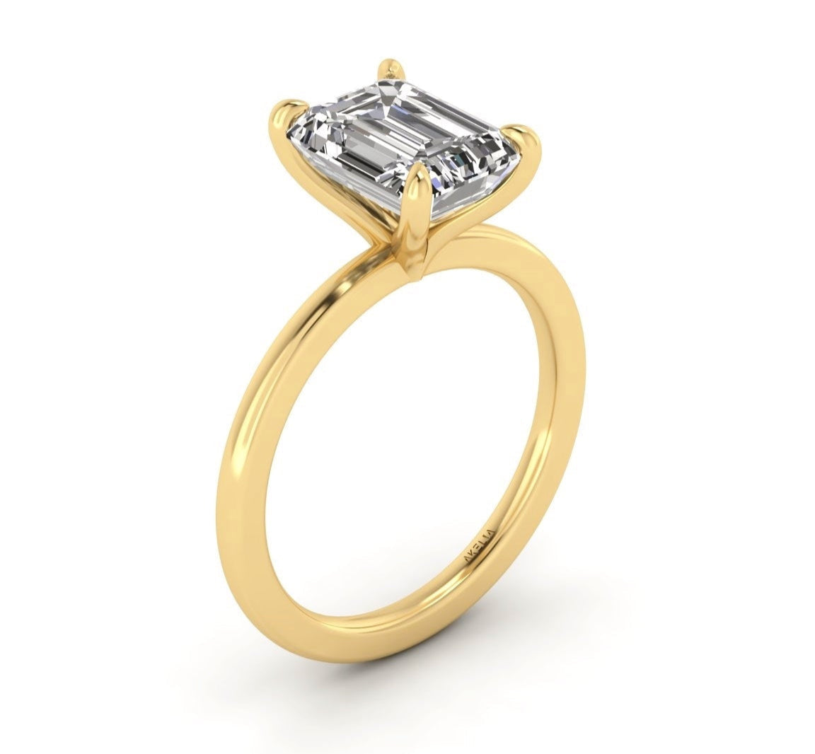 Classic Emerald Solitaire Engagement Ring