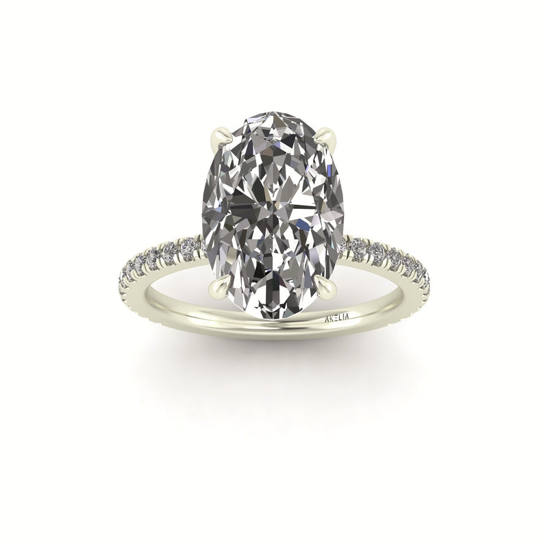 Classic Oval Solitaire With Diamond Shank