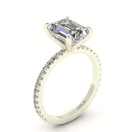 Classic Emerald Solitaire With Diamond Shank