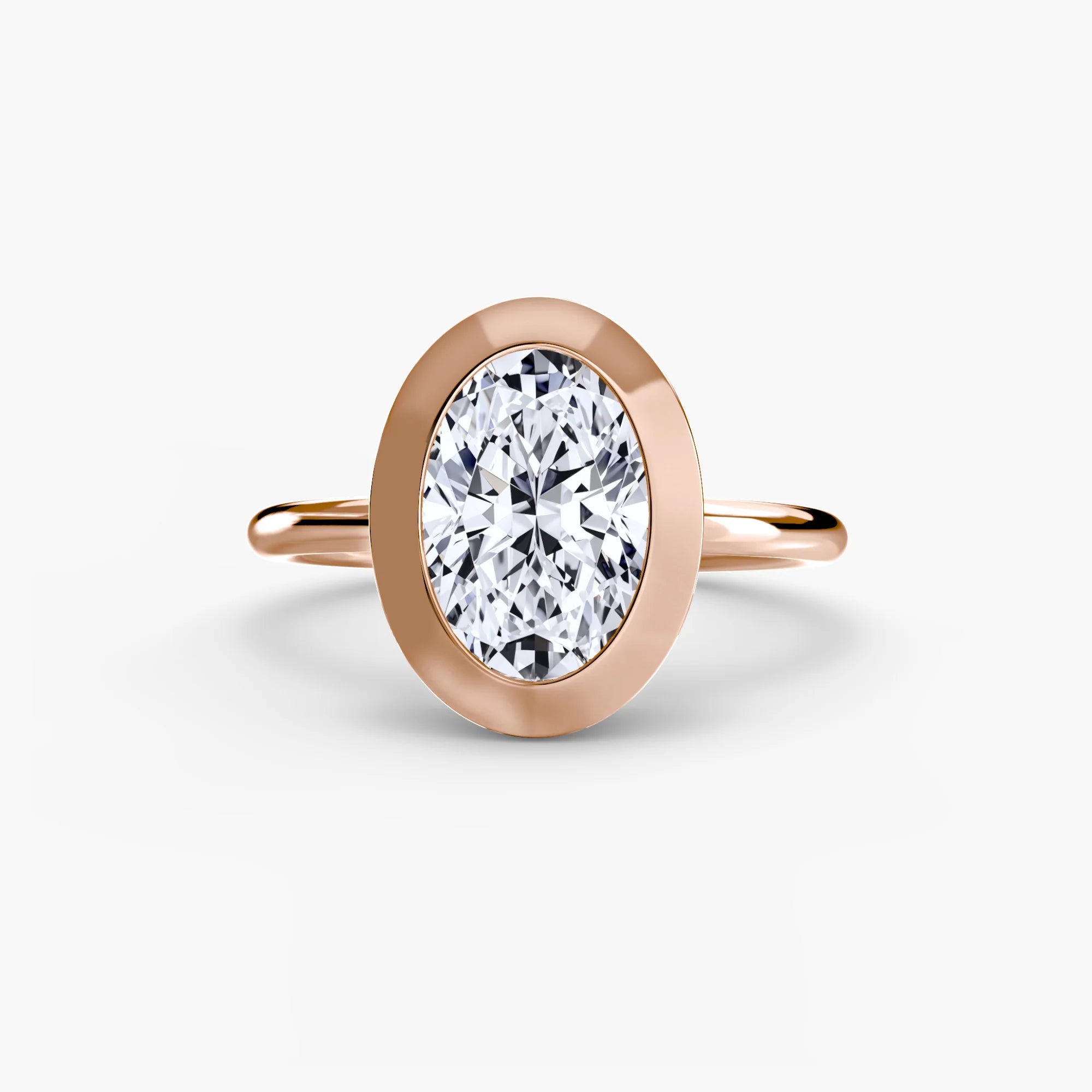Oval Diamond Bezel Set Solitaire Ring