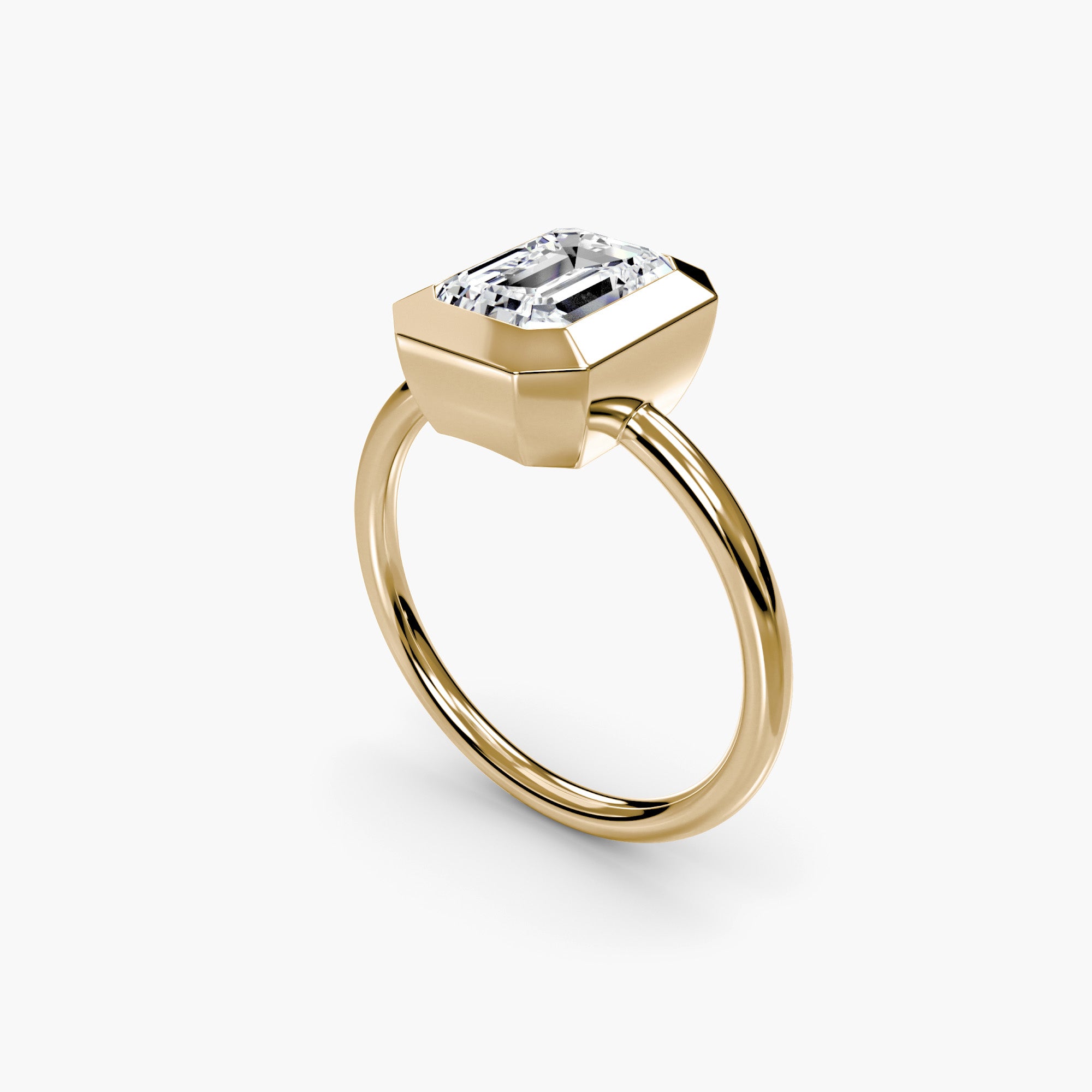 Emerald Diamond Bezel Set Solitaire Ring