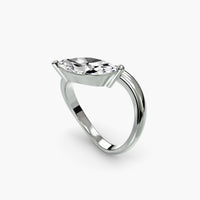white golf ring with a clear gemstone on a white background