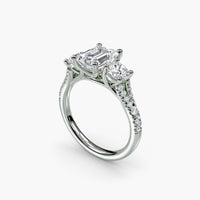 Emerald Split Shank Three Stone Pavé Ring