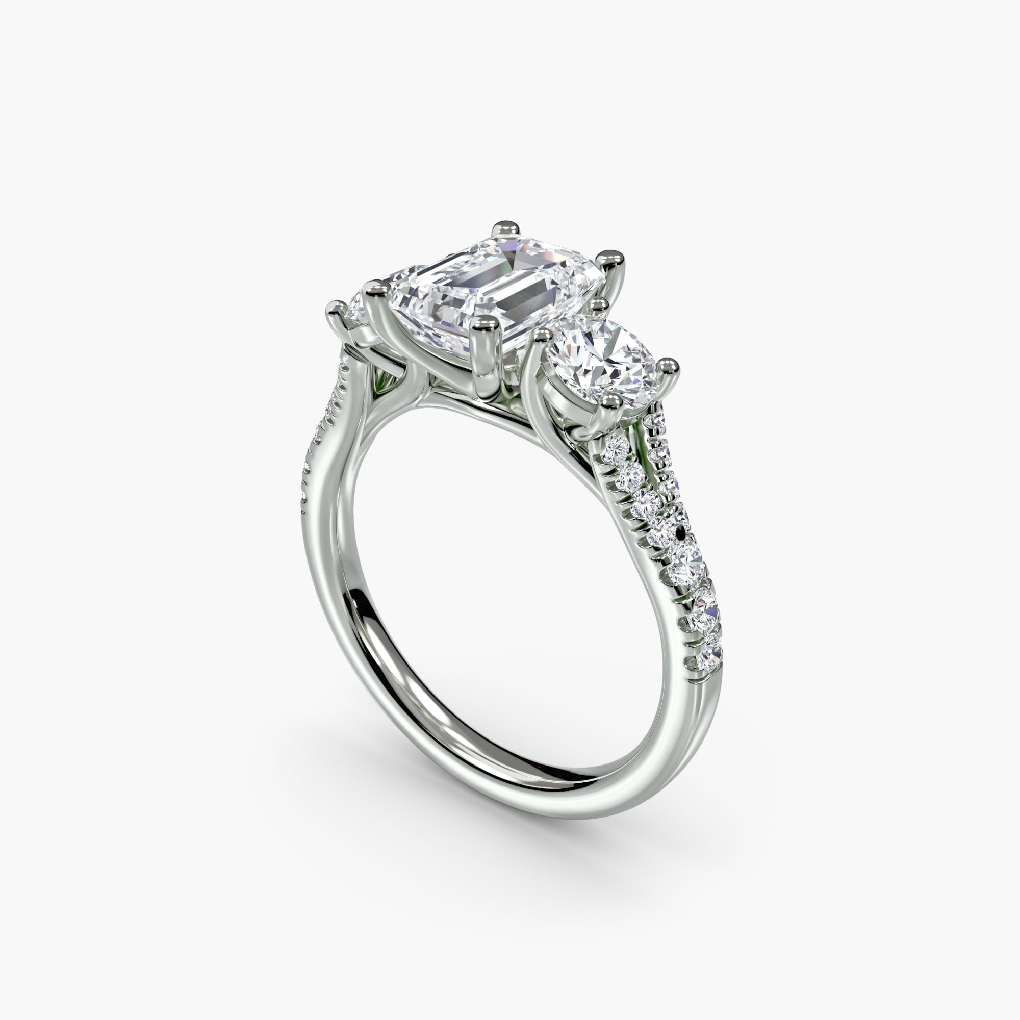 Emerald Split Shank Three Stone Pavé Ring