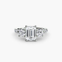 Emerald Split Shank Three Stone Pavé Ring