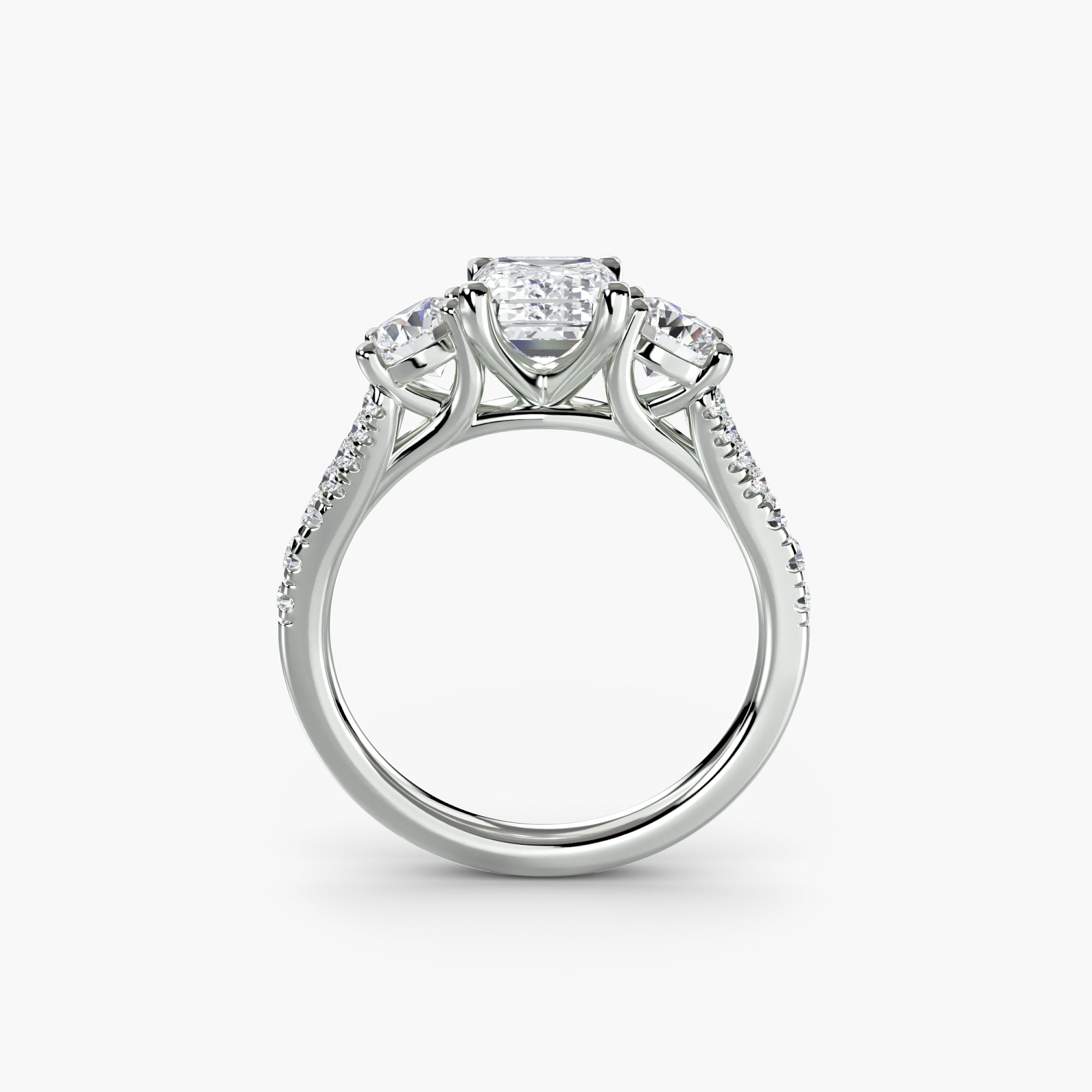 Emerald Split Shank Three Stone Pavé Ring