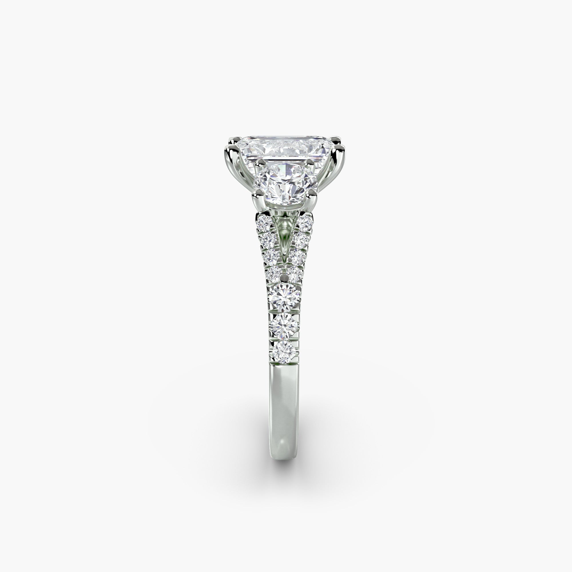 Emerald Split Shank Three Stone Pavé Ring