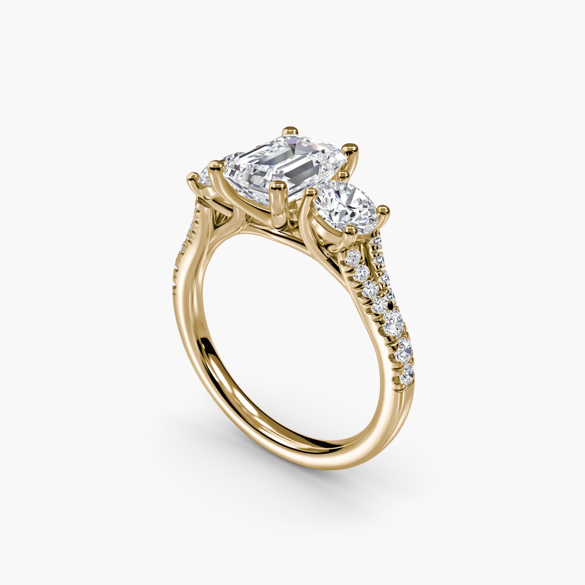 Emerald Split Shank Three Stone Pavé Ring