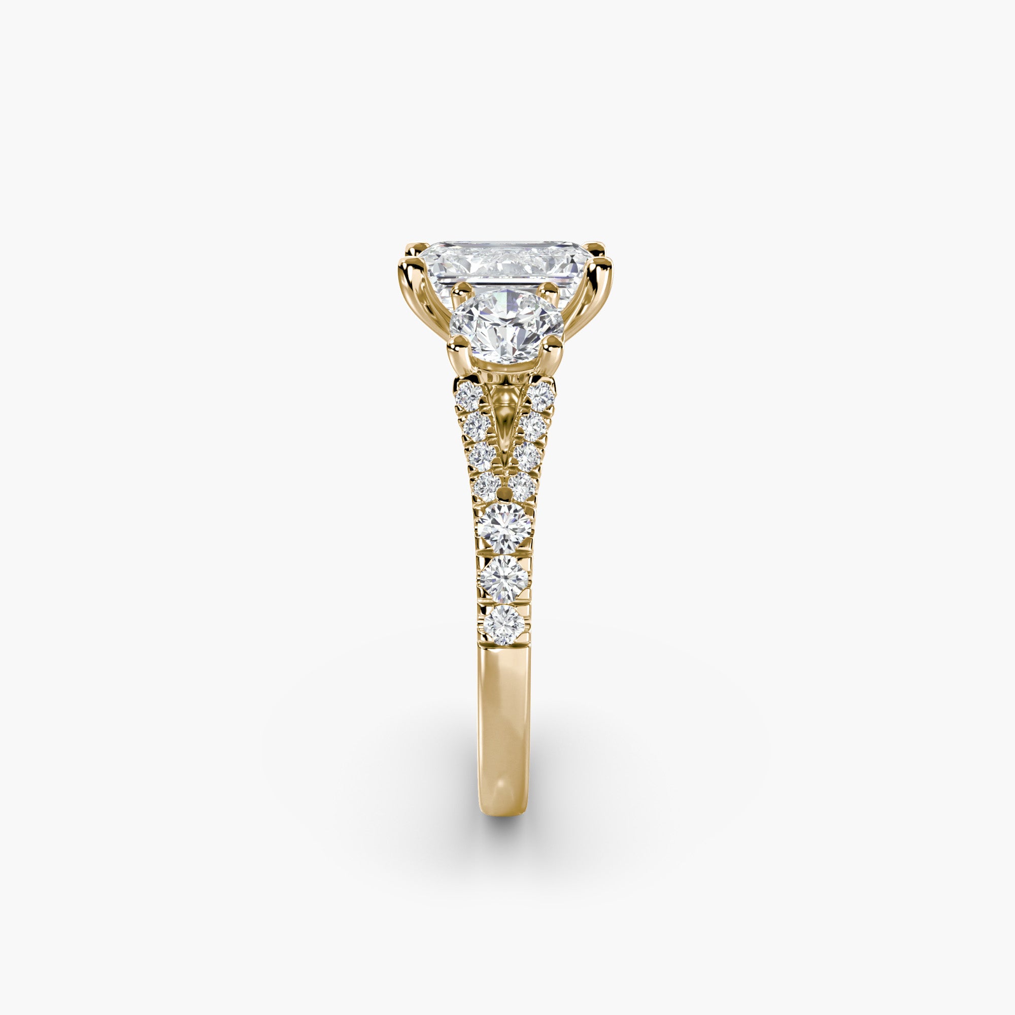 Emerald Split Shank Three Stone Pavé Ring