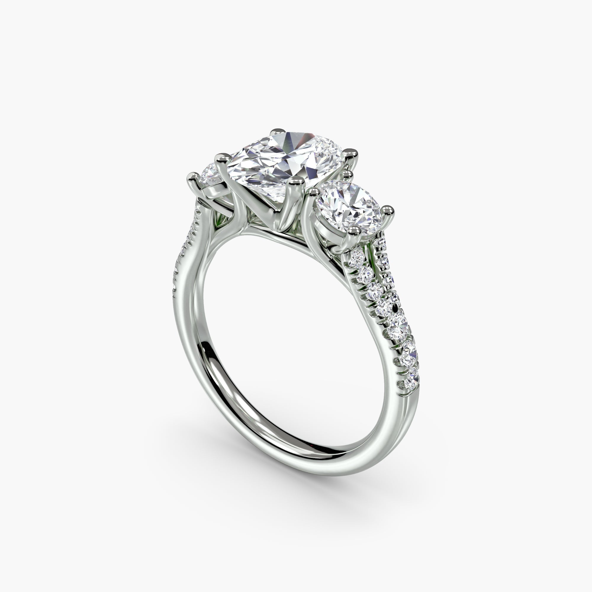 Oval Split Shank Three Stone Pavé Ring