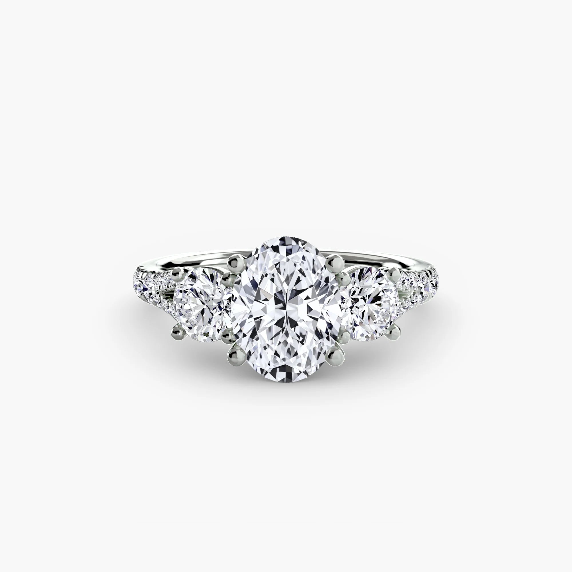 Oval Split Shank Three Stone Pavé Ring
