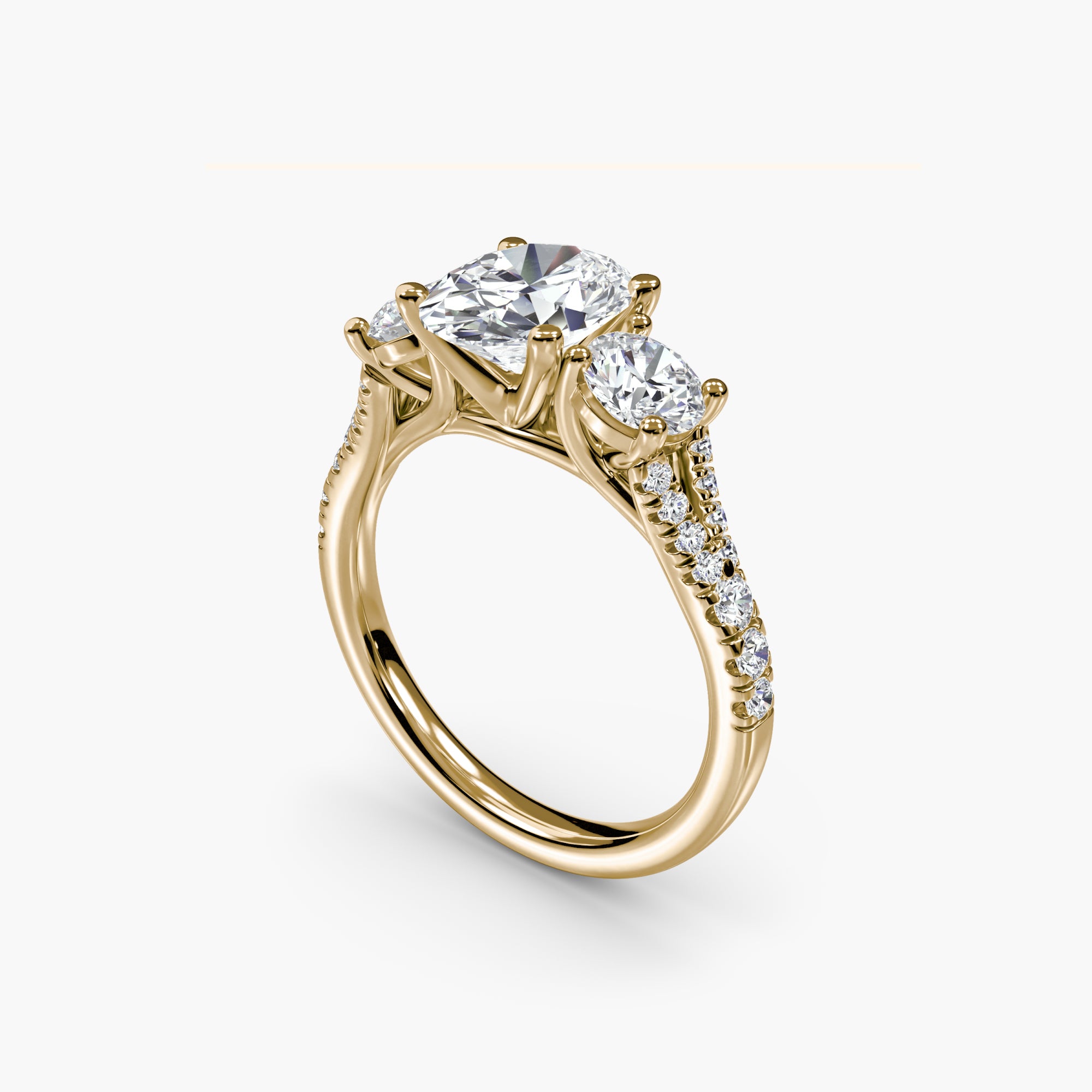 Oval Split Shank Three Stone Pavé Ring