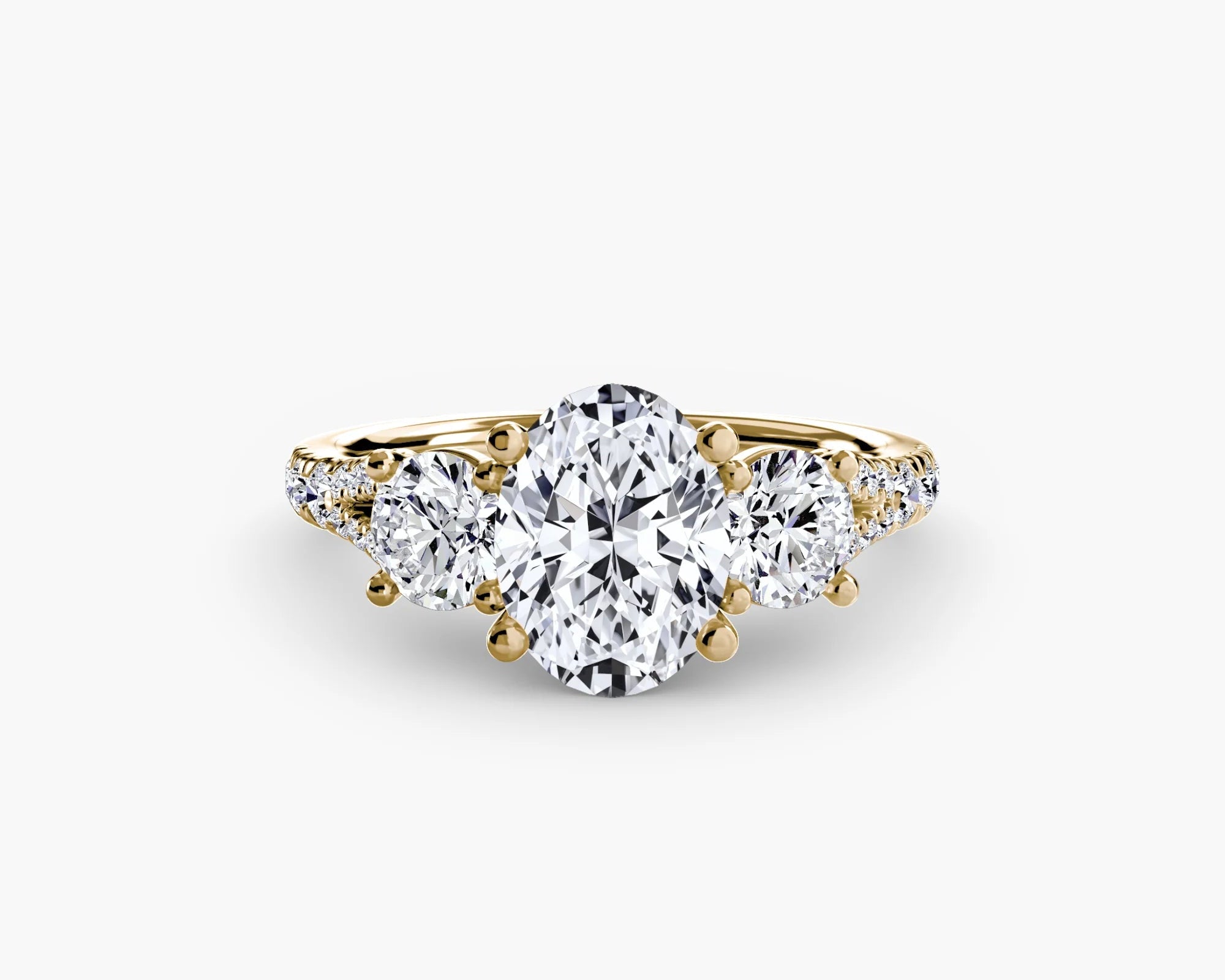 Oval Split Shank Three Stone Pavé Ring