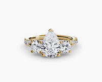 Gold and diamond ring on a white background