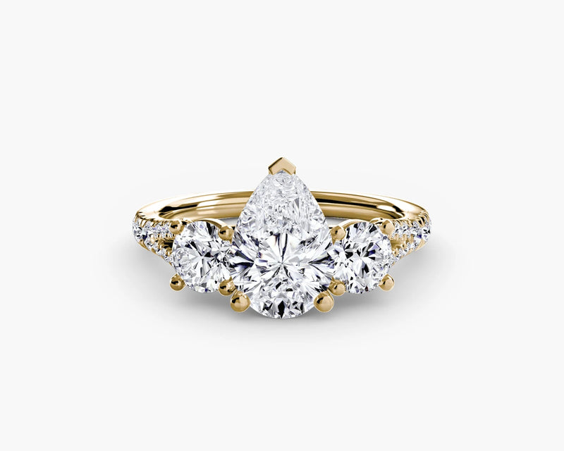 Gold and diamond ring on a white background