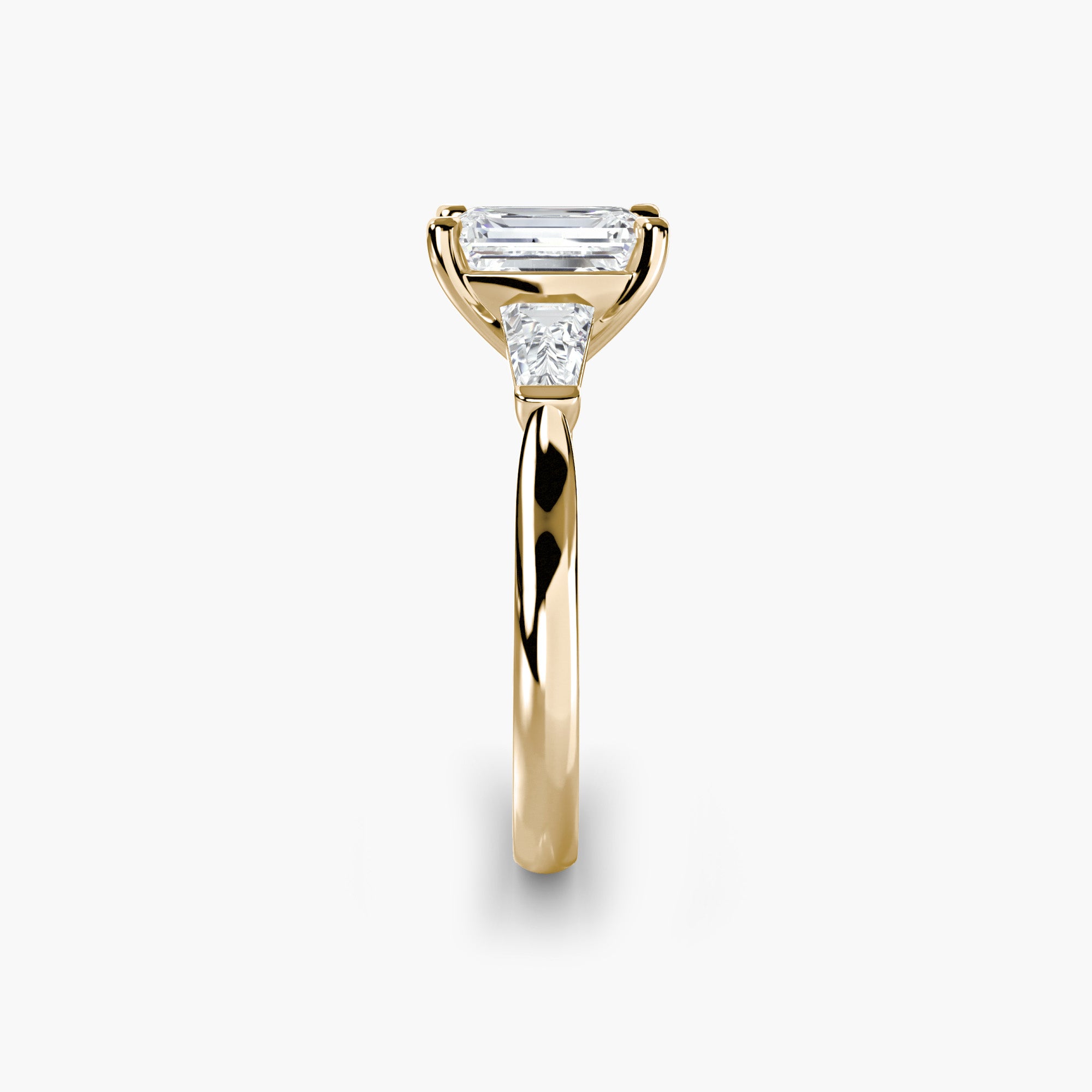 Emerald Three Stone Tapered Baguette Ring