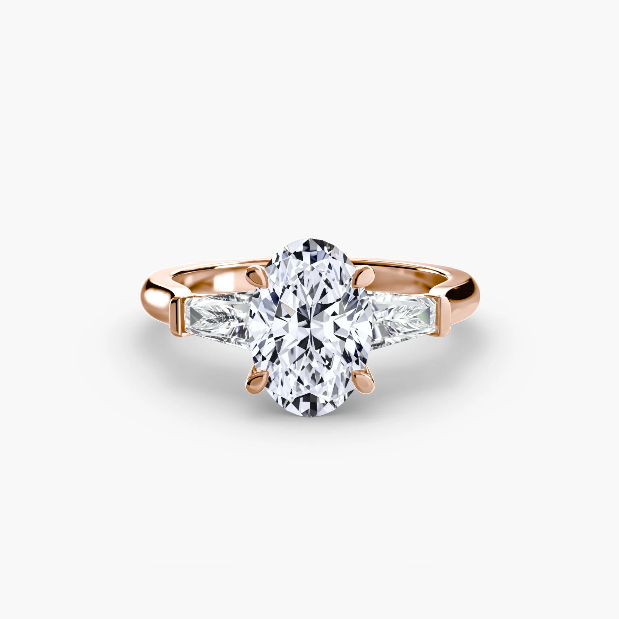 Oval Three Stone Tapered Baguette Ring