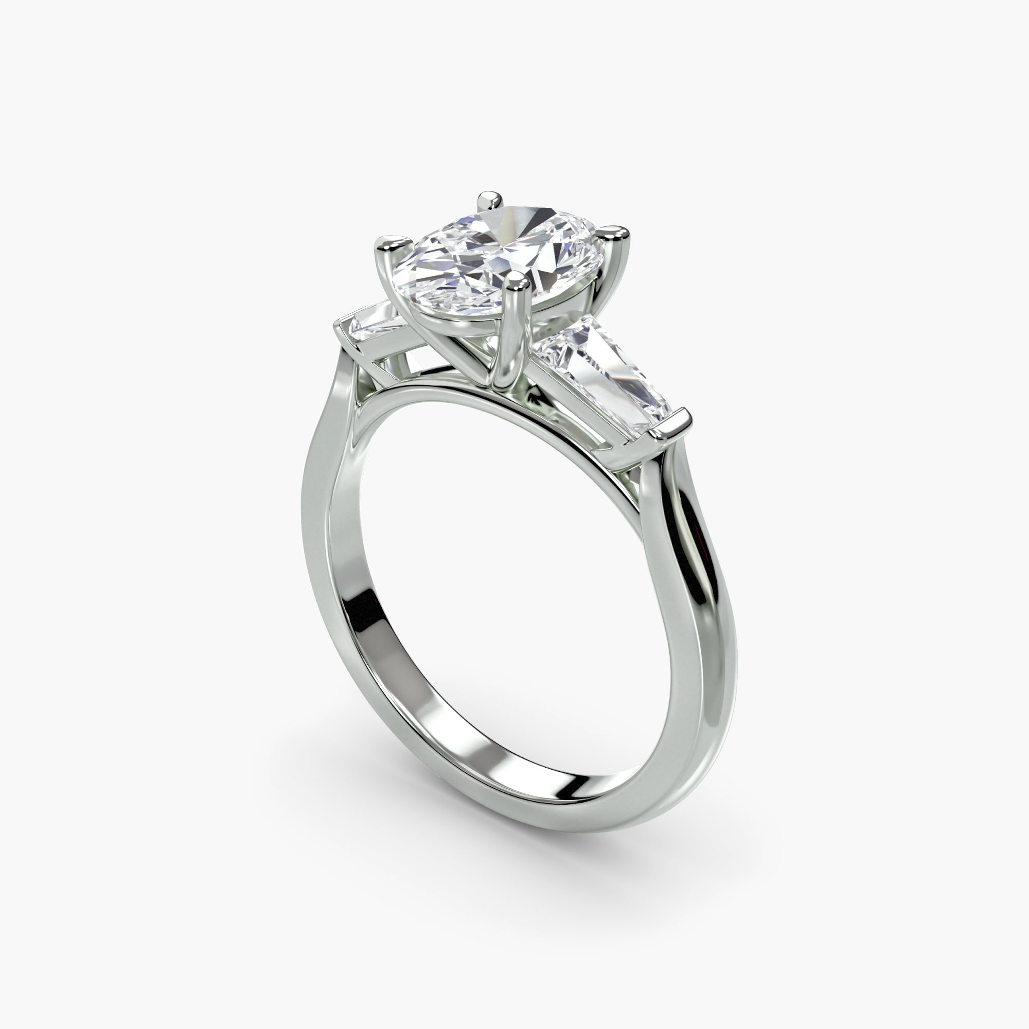 Oval Three Stone Tapered Baguette Ring