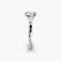 Oval Three Stone Tapered Baguette Ring
