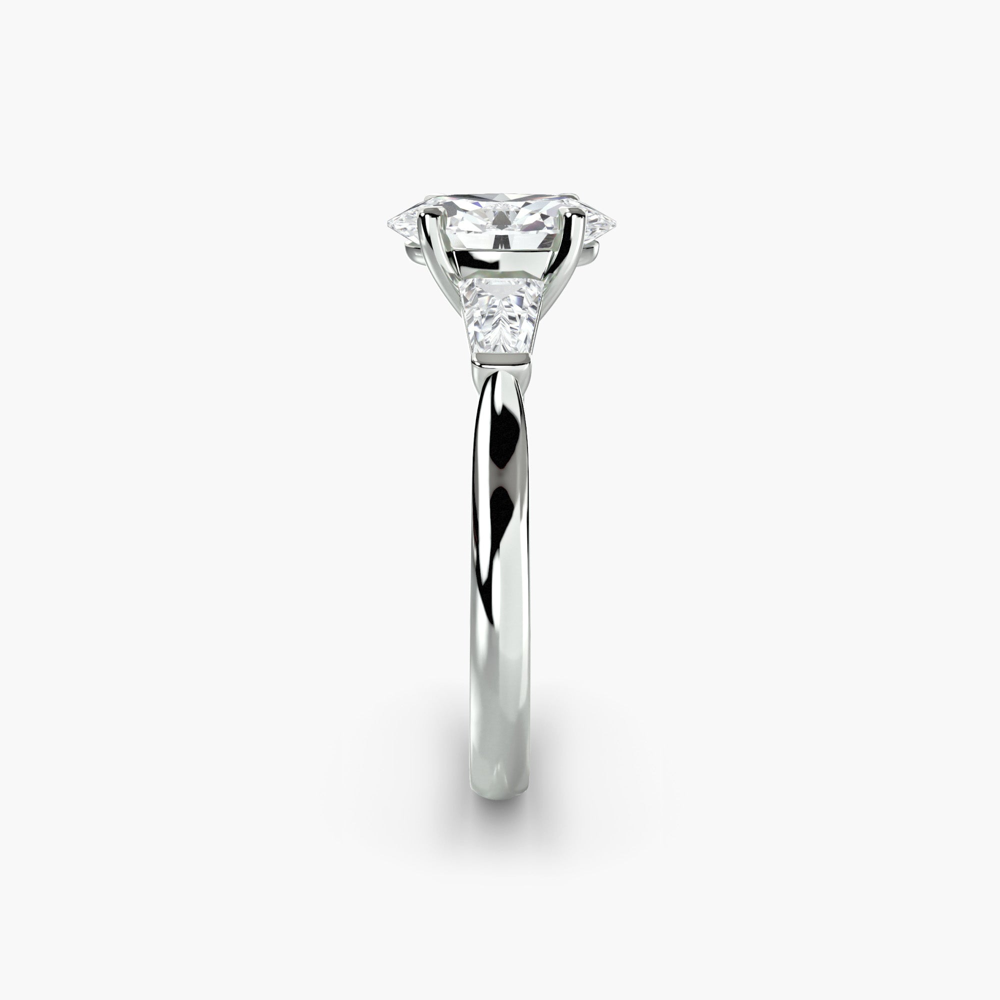 Oval Three Stone Tapered Baguette Ring