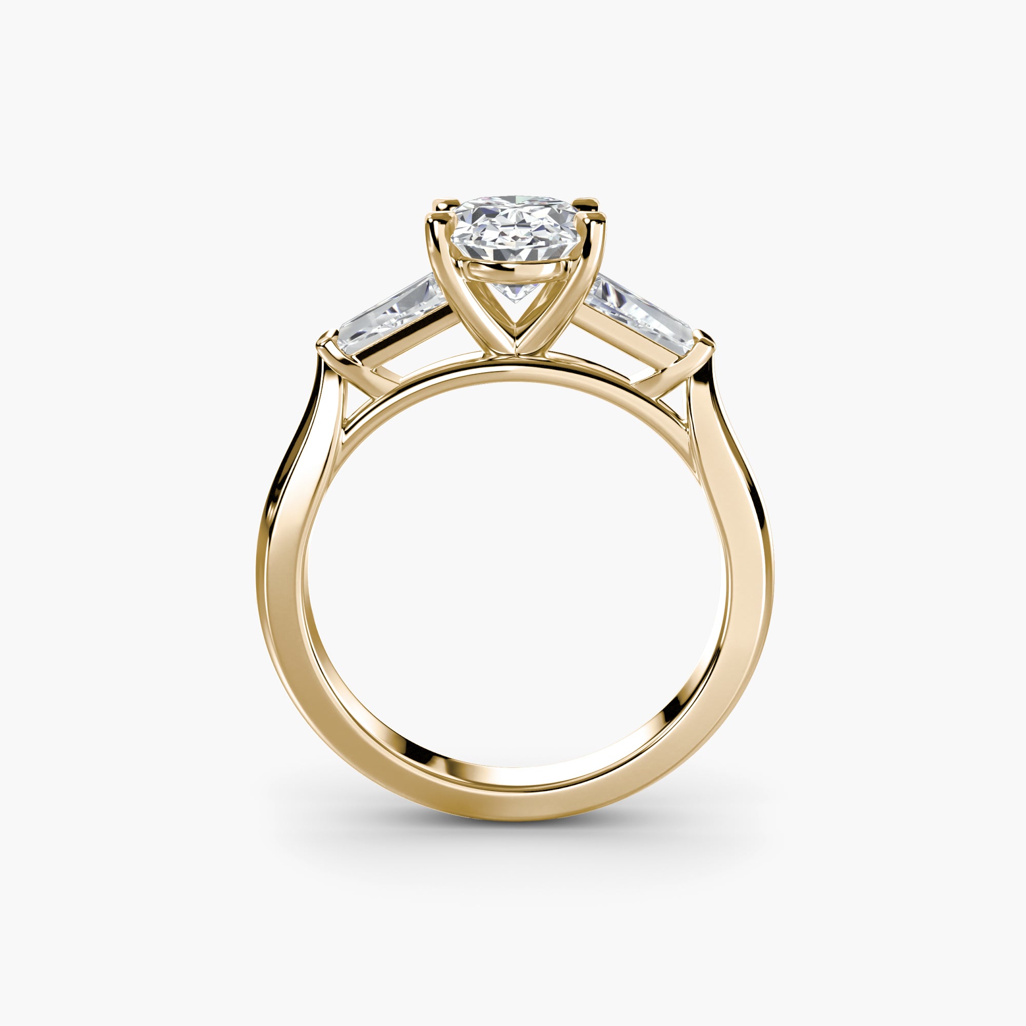 Oval Three Stone Tapered Baguette Ring