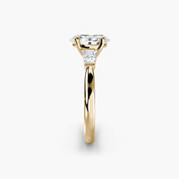 Gold ring with a diamond on a white background