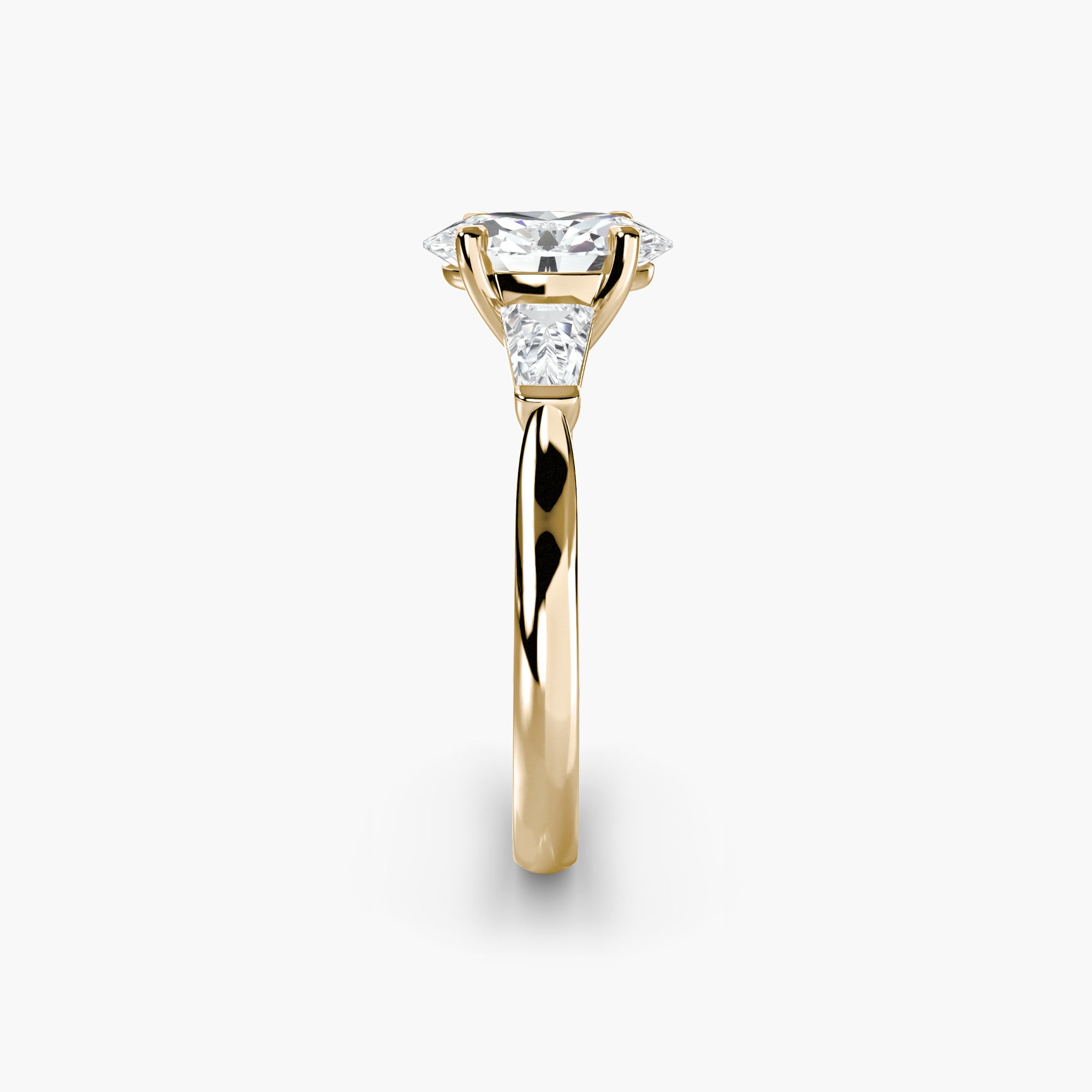 Gold ring with a diamond on a white background