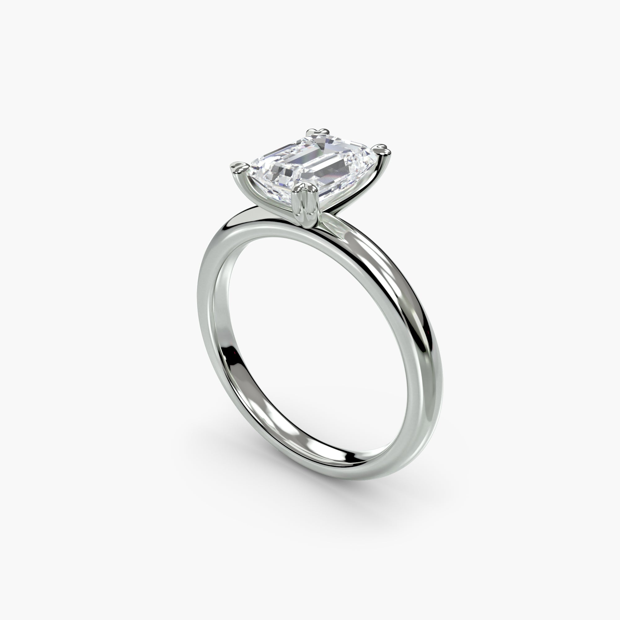 Heart Prong Emerald Solitaire Engagement Ring