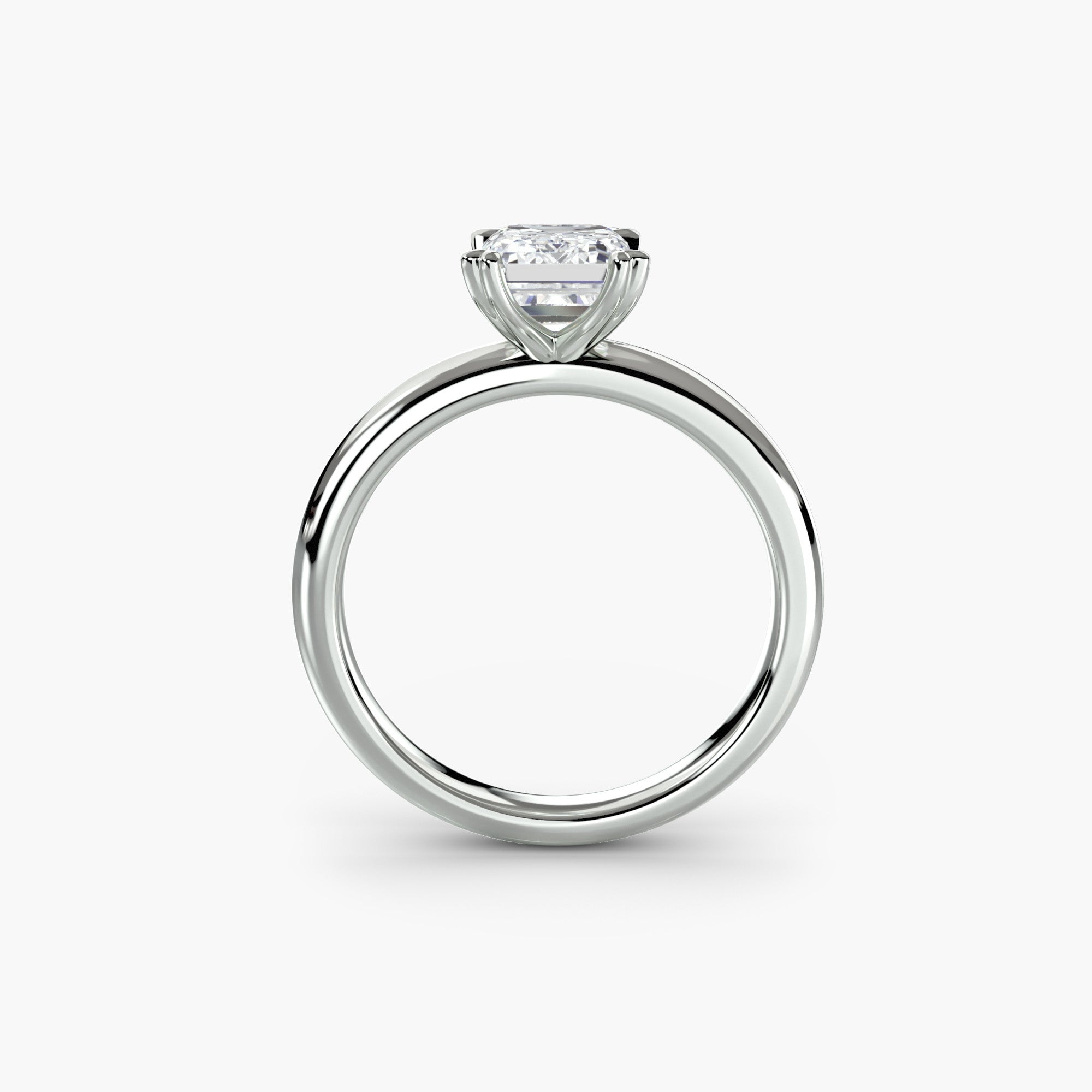 Heart Prong Emerald Solitaire Engagement Ring