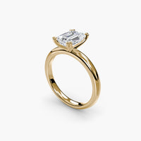 Heart Prong Emerald Solitaire Engagement Ring