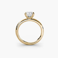 Heart Prong Emerald Solitaire Engagement Ring