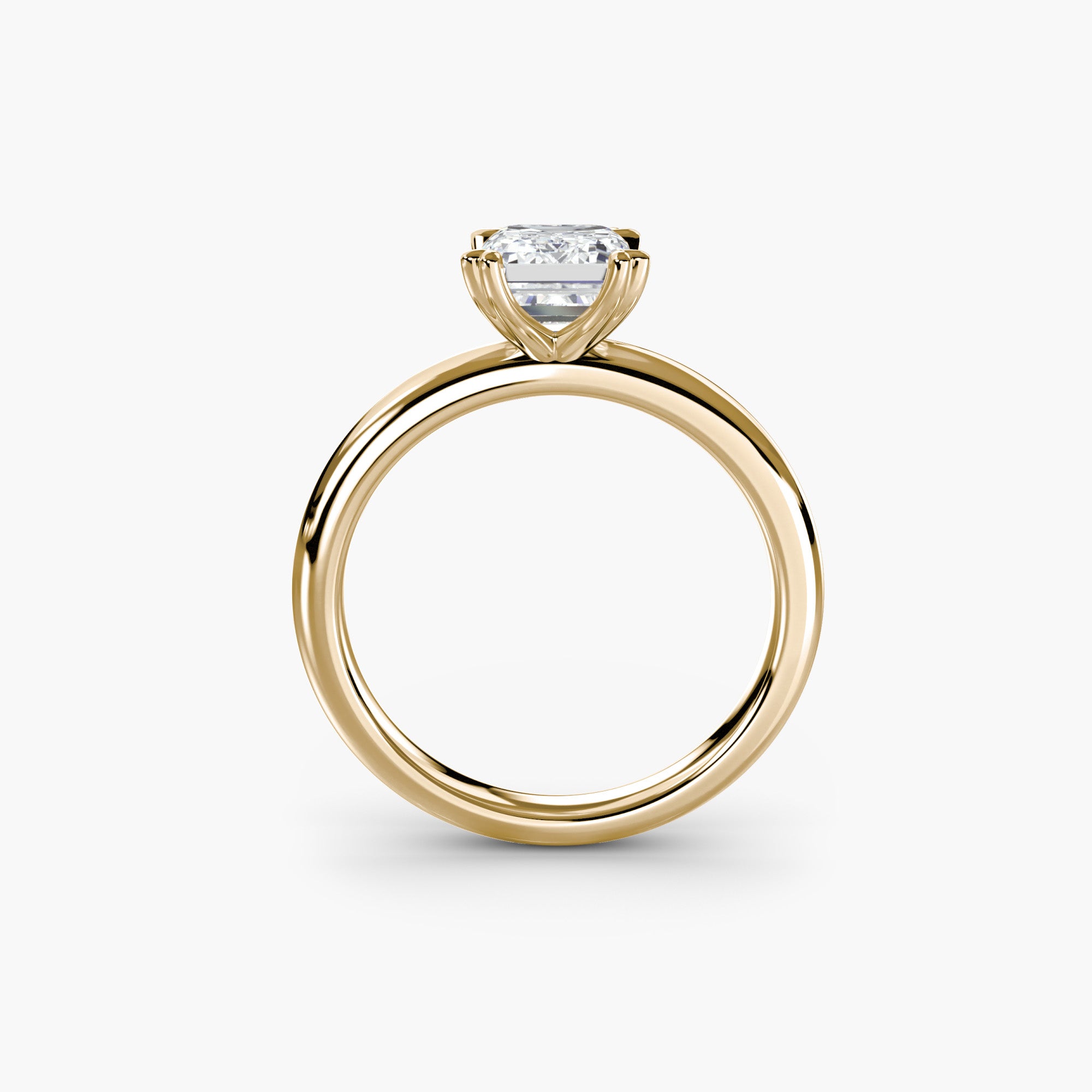 Heart Prong Emerald Solitaire Engagement Ring