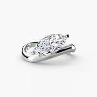 Diamond ring with a pear-shaped gemstone on a white background