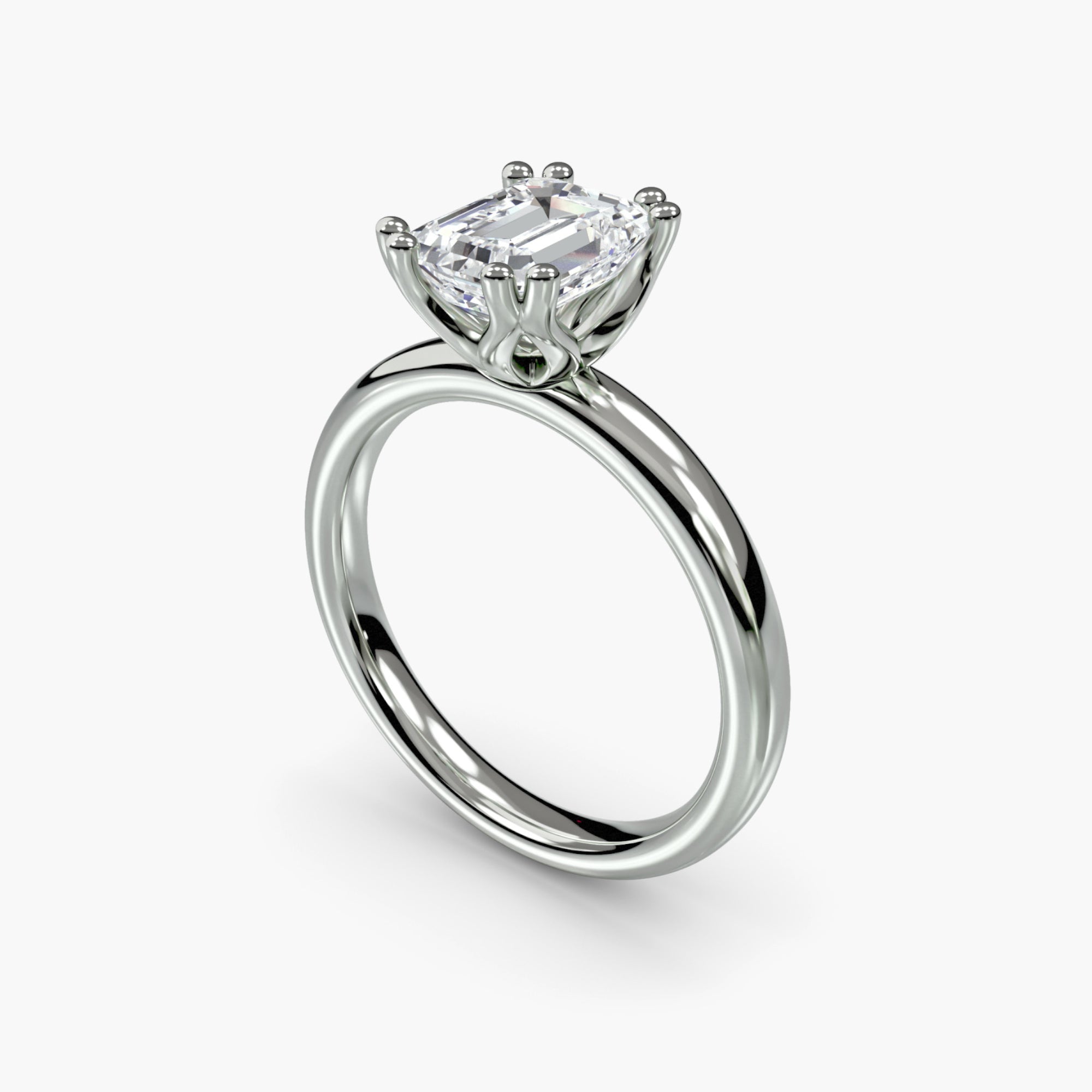Double Prong Emerald Solitaire ring