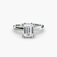 Double Prong Emerald Solitaire ring