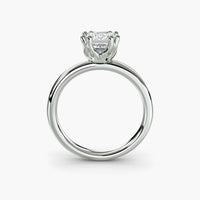 Double Prong Emerald Solitaire ring