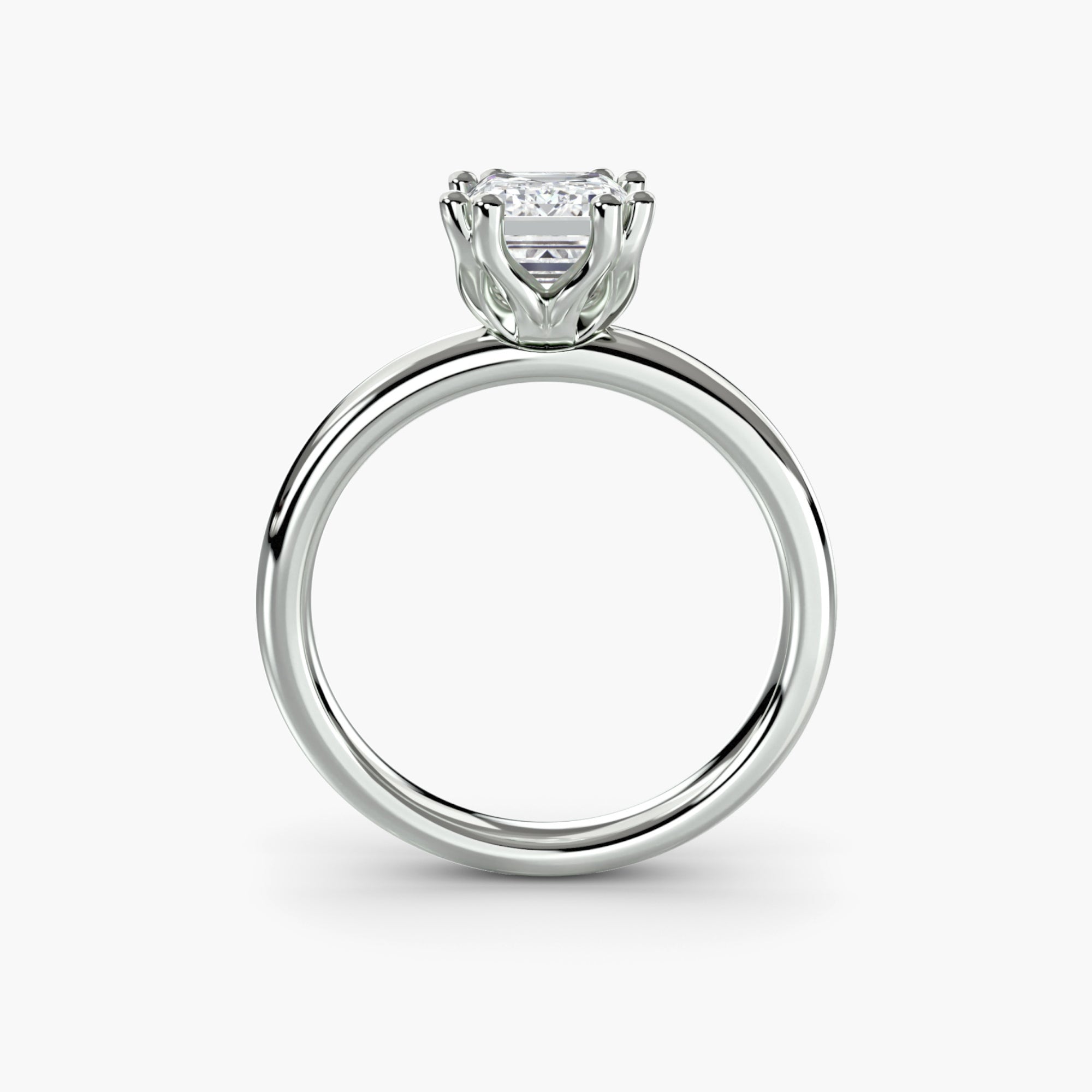 Double Prong Emerald Solitaire ring