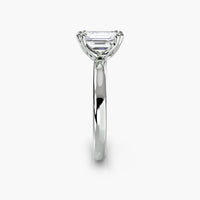 Double Prong Emerald Solitaire ring