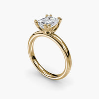 Double Prong Emerald Solitaire ring