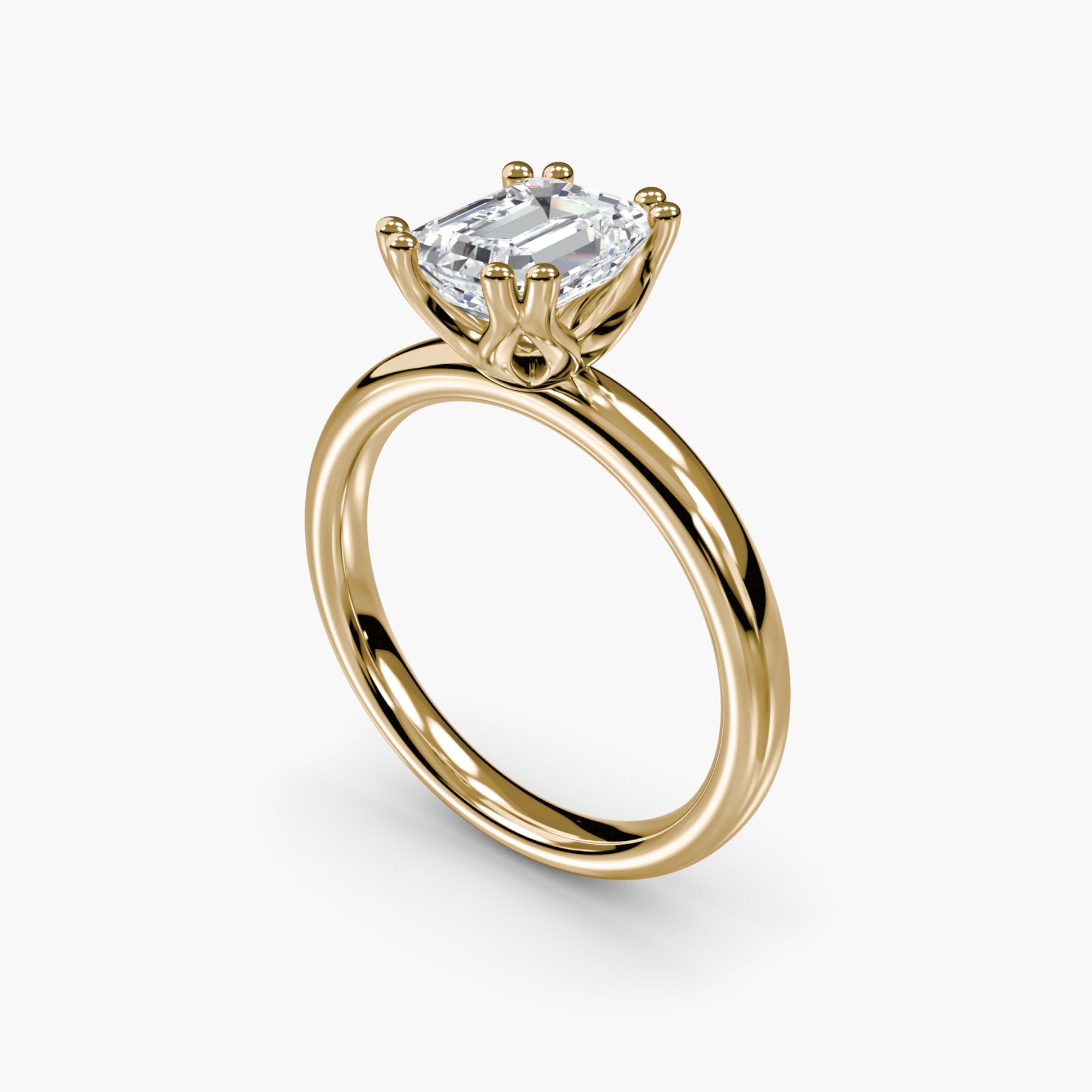 Double Prong Emerald Solitaire ring