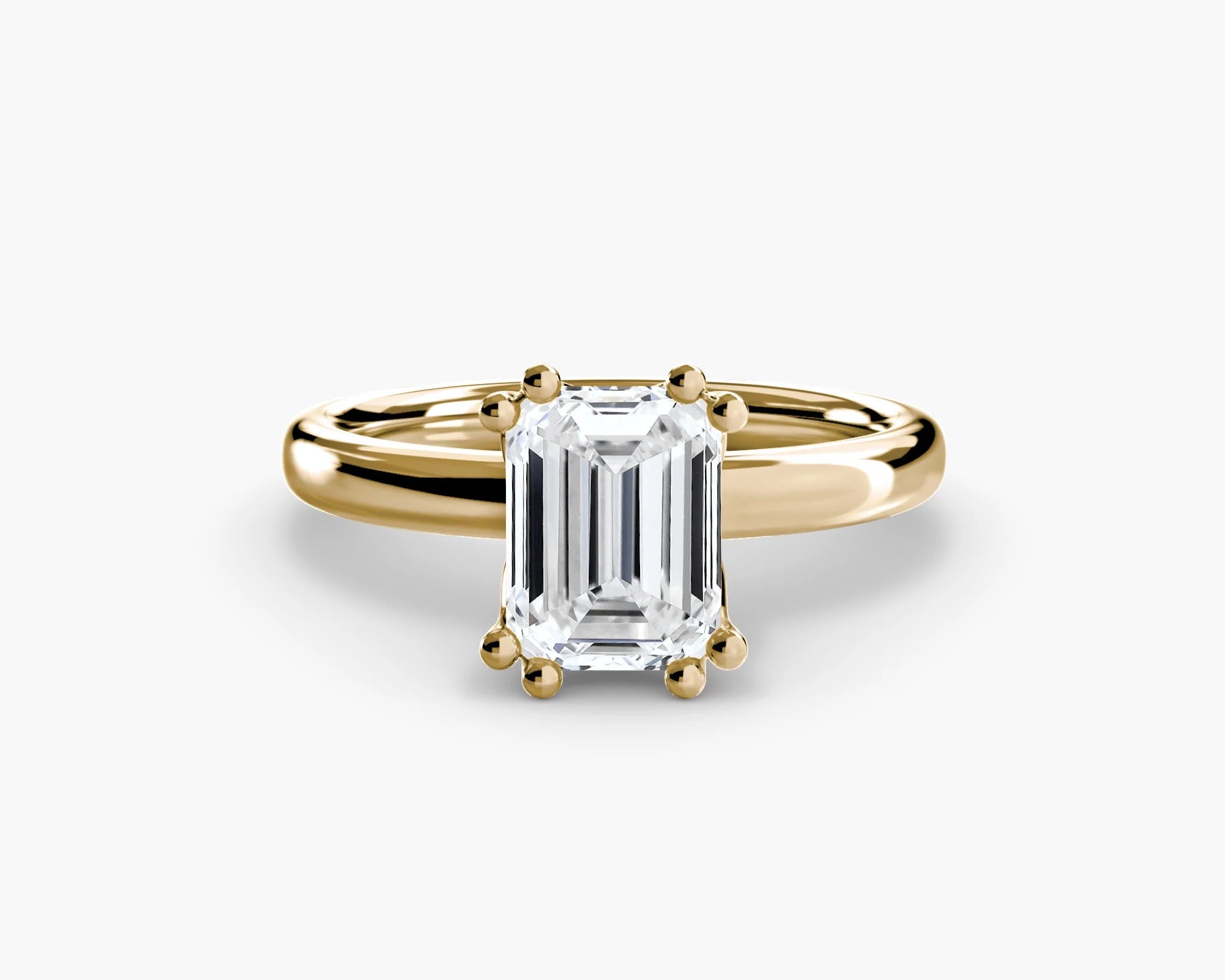 Double Prong Emerald Solitaire ring