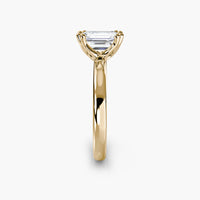 Double Prong Emerald Solitaire ring