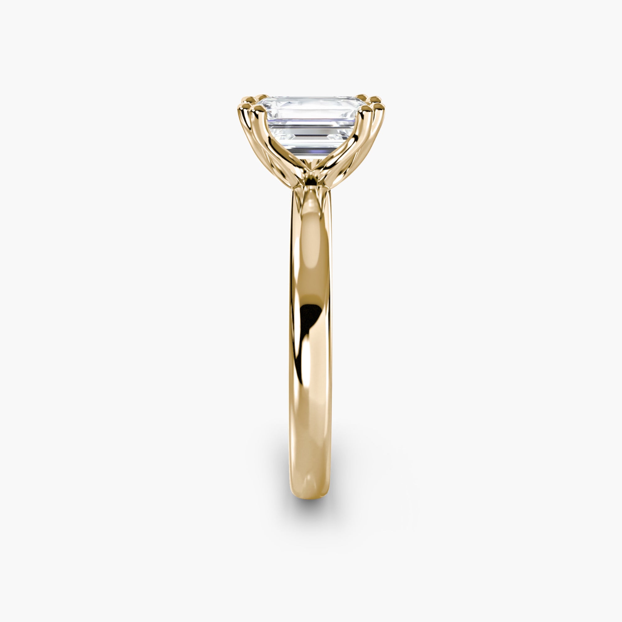 Double Prong Emerald Solitaire ring