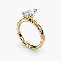 Double Prong Pear Solitaire ring