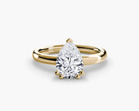 Double Prong Pear Solitaire ring